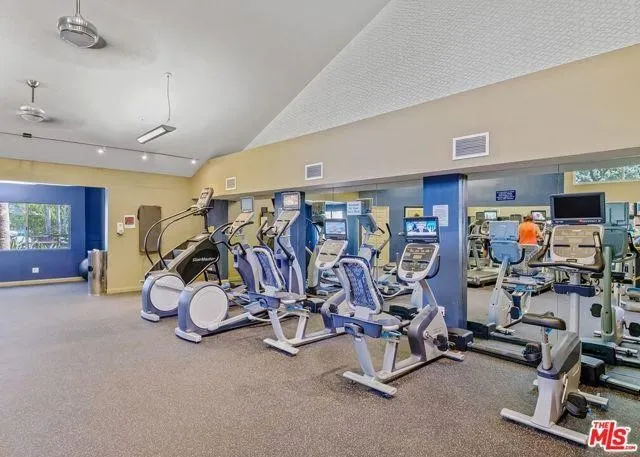 a view of a room with gym equipment