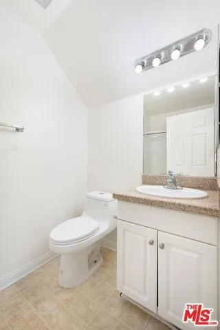 a bathroom with a shower and a shower