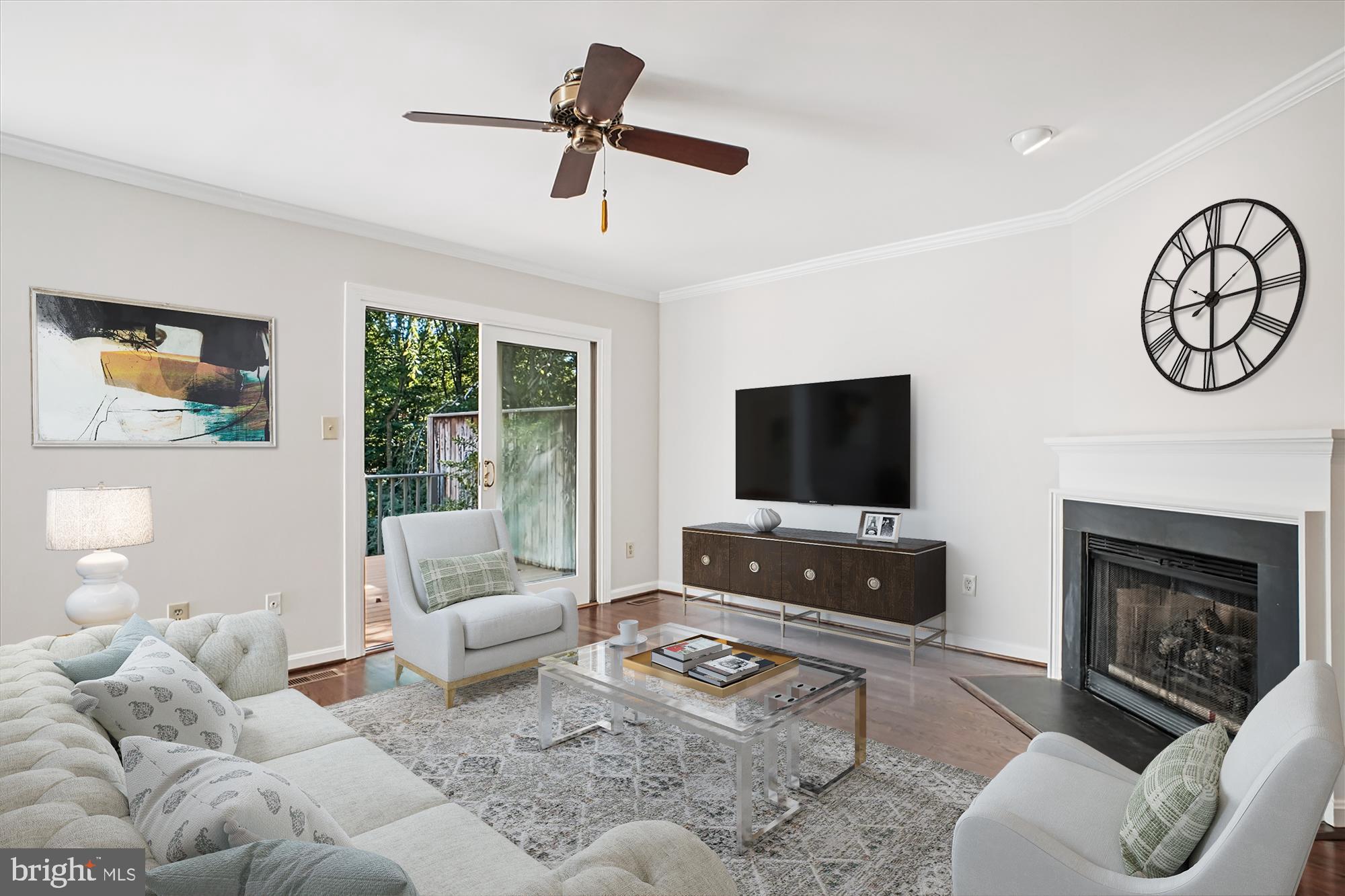2697 Marcey Road Arlington, VA 22207 - Photo 16 of 64 a living room with furniture a flat screen tv and a fireplace