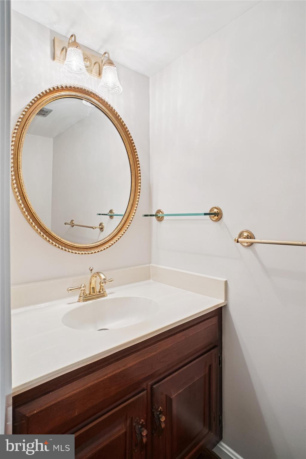 2697 Marcey Road Arlington, VA 22207 - Photo 20 of 64 a bathroom with a sink and a mirror