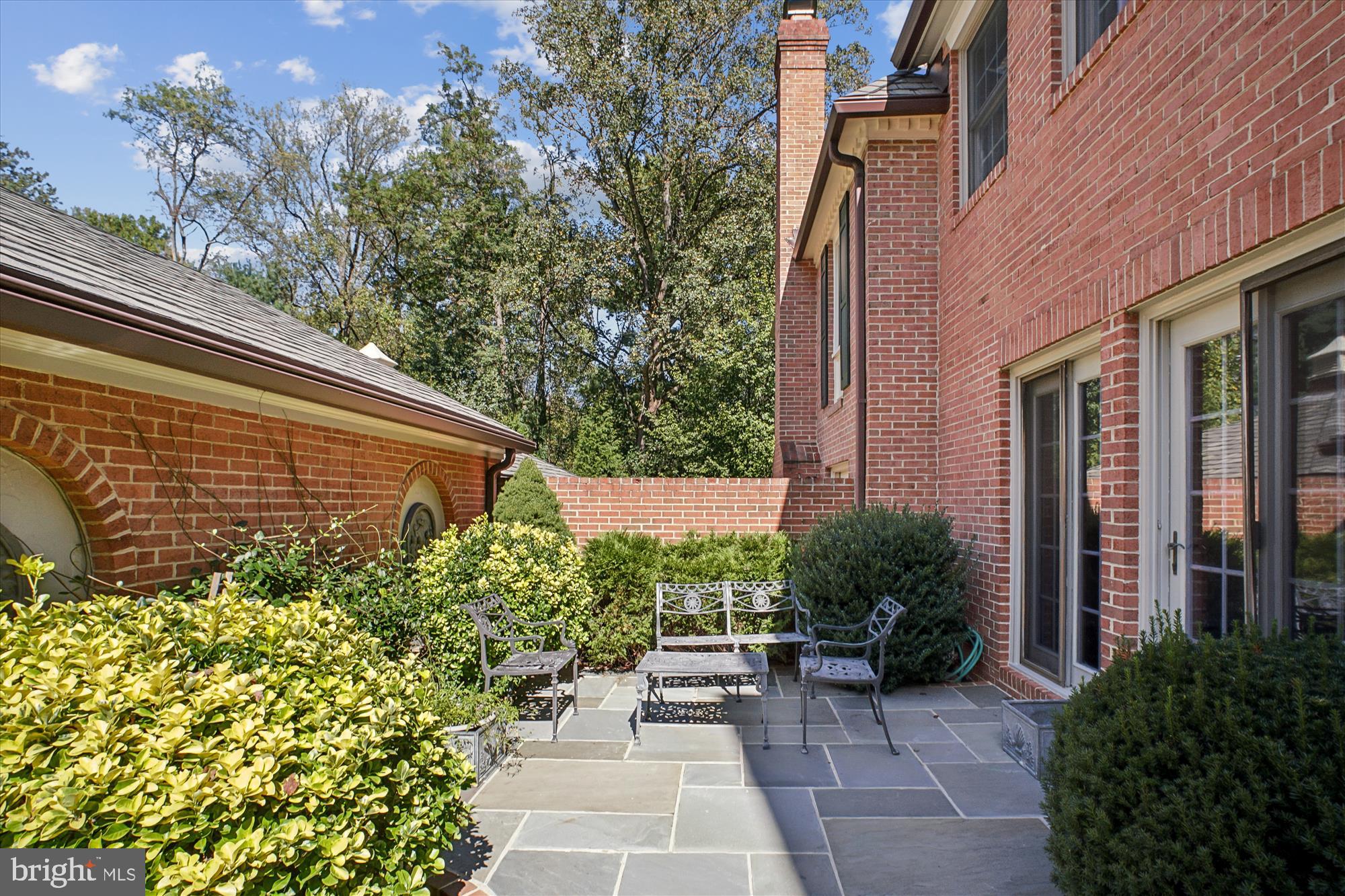 2697 Marcey Road Arlington, VA 22207 - Photo 2 of 64 a view of a patio with chairs and potted plants