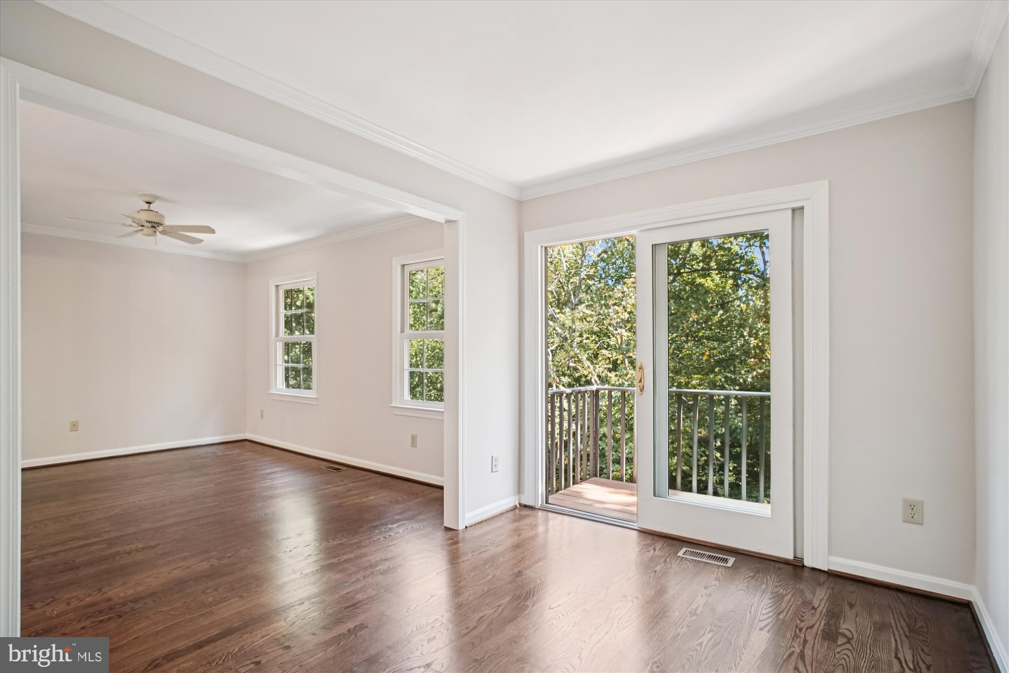 2697 Marcey Road Arlington, VA 22207 - Photo 25 of 64 a view of an empty room with wooden floor and a window