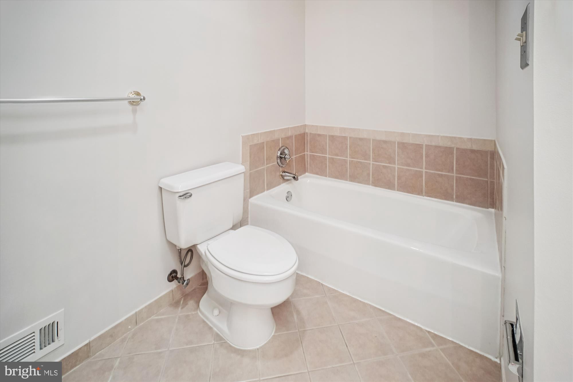 2697 Marcey Road Arlington, VA 22207 - Photo 31 of 64 a bathroom with a toilet and bathtub