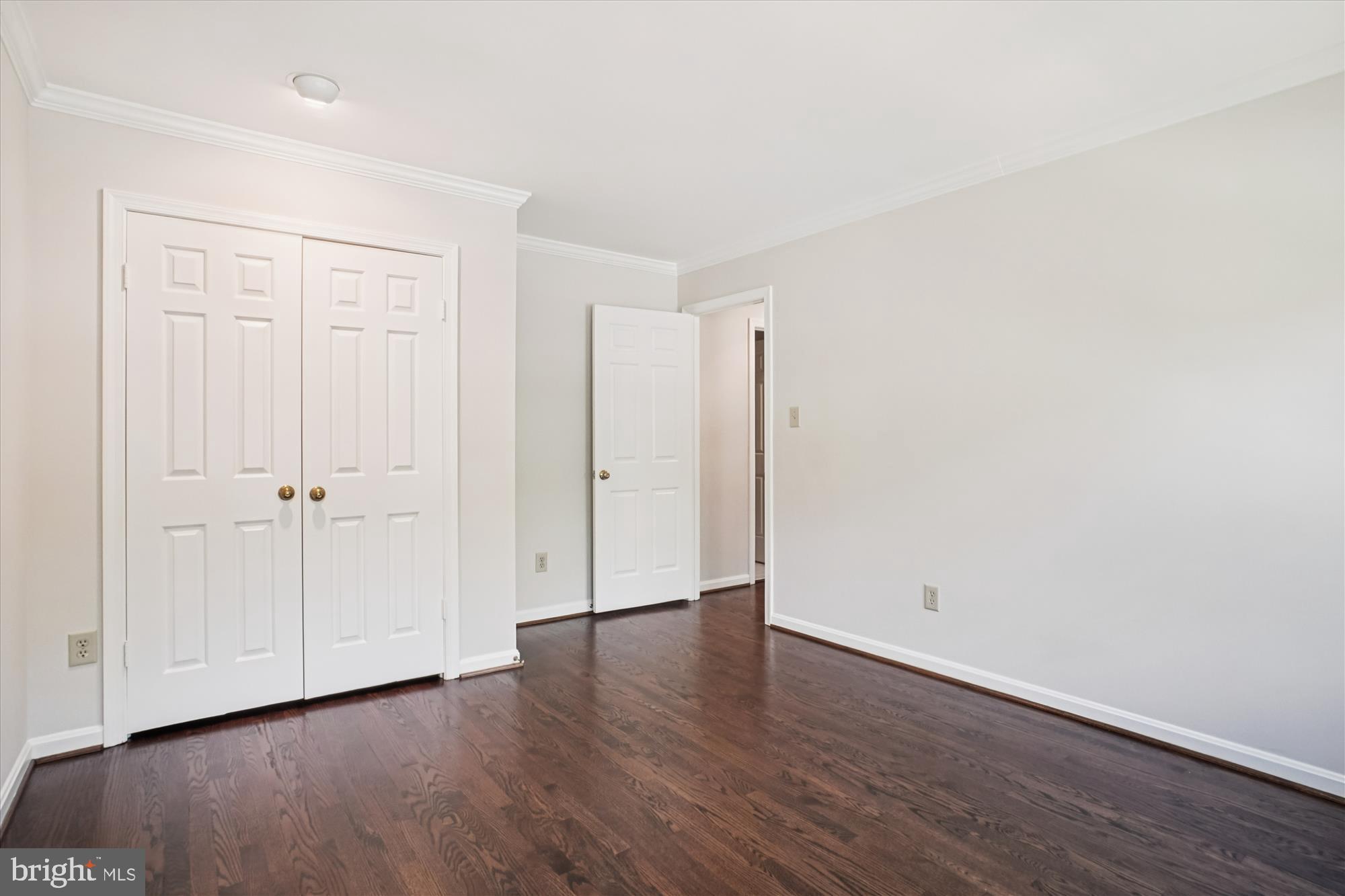 2697 Marcey Road Arlington, VA 22207 - Photo 37 of 64 a view of an empty room with wooden floor