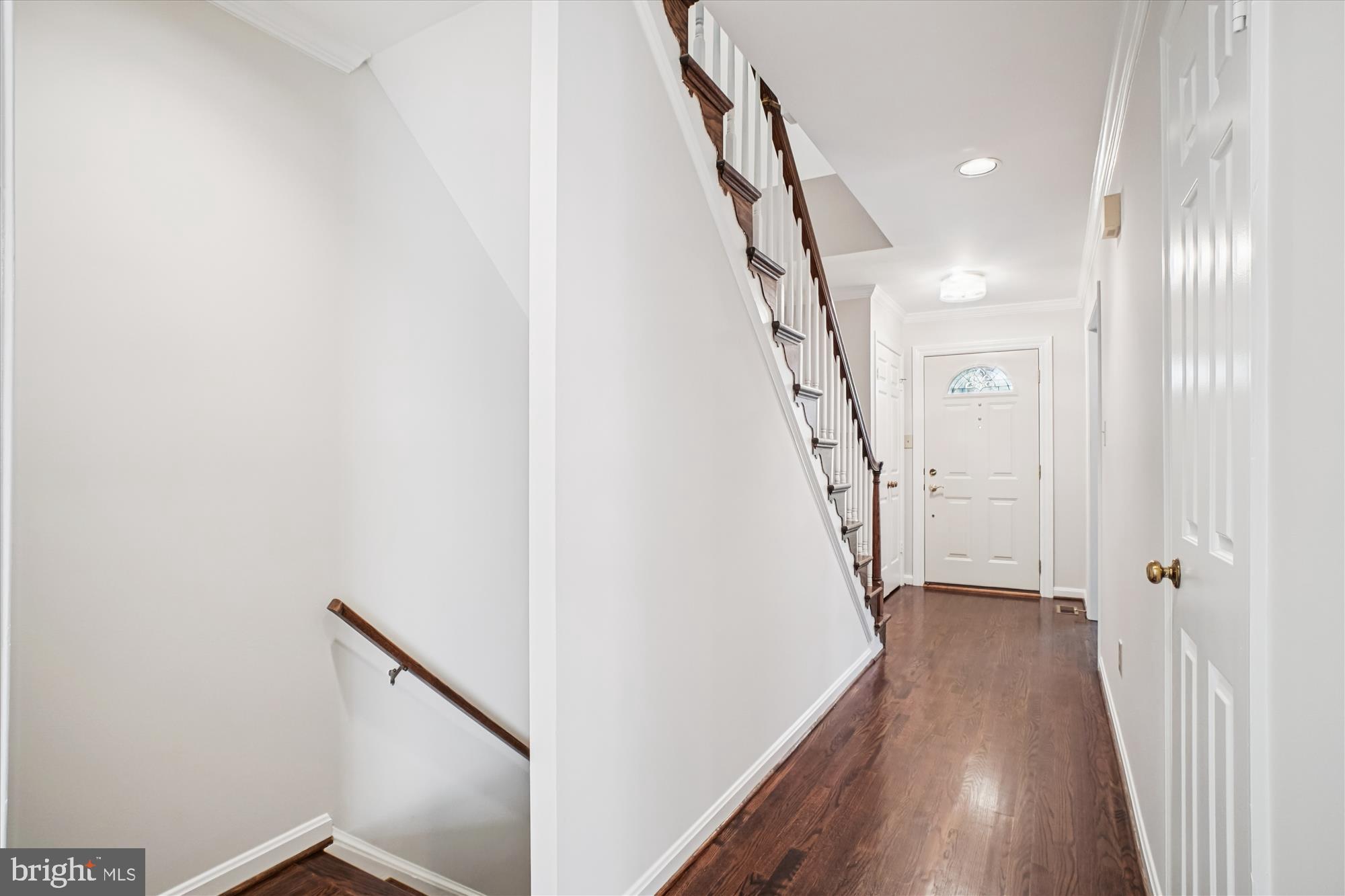 2697 Marcey Road Arlington, VA 22207 - Photo 38 of 64 a view of a hallway with wooden floor and entryway