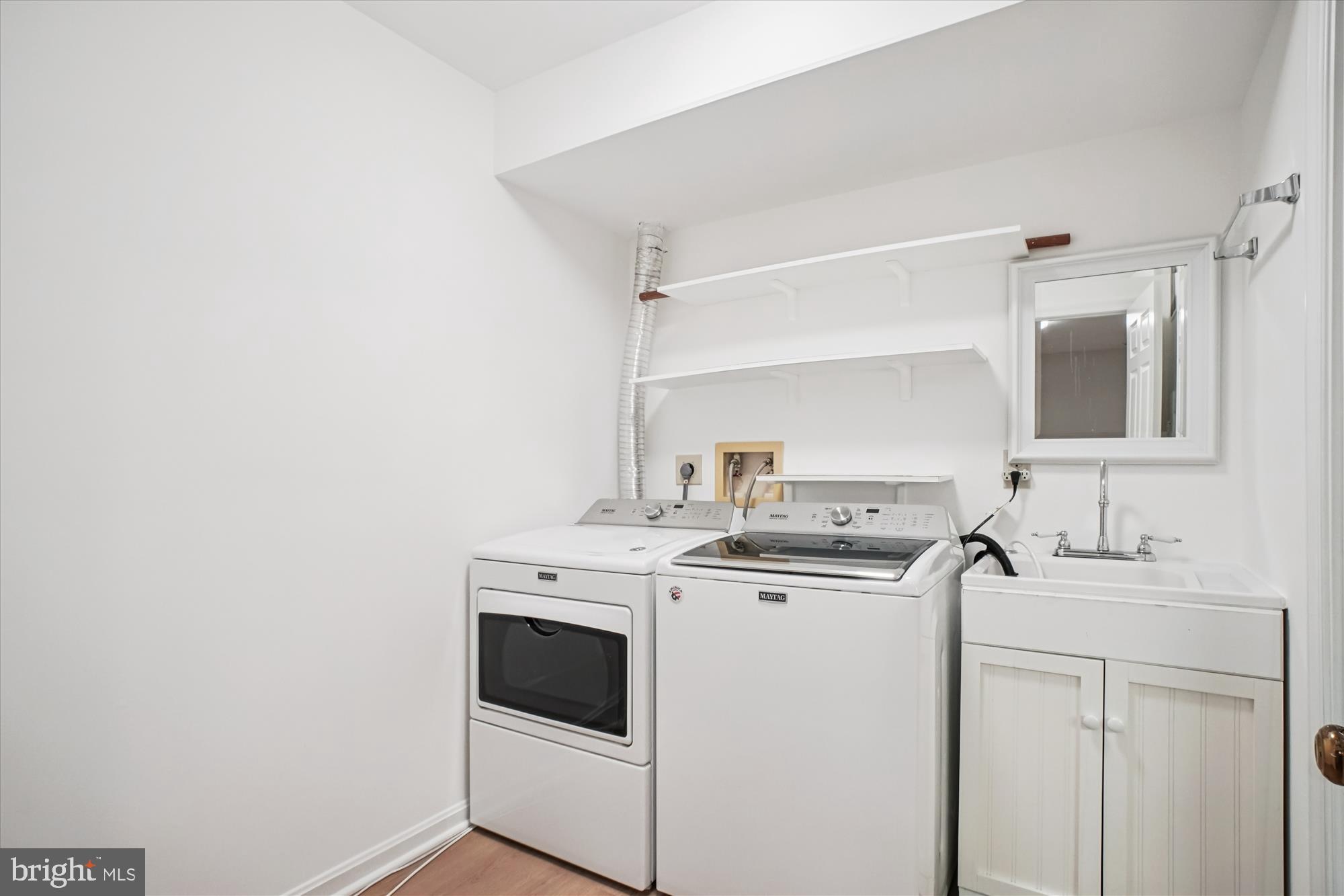 2697 Marcey Road Arlington, VA 22207 - Photo 46 of 64 a view of washer and dryer with bathroom