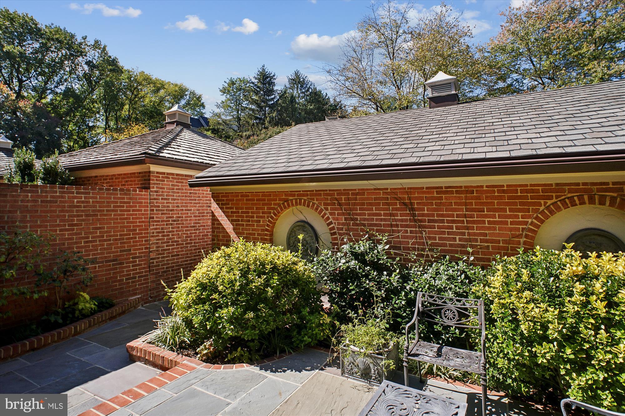 2697 Marcey Road Arlington, VA 22207 - Photo 55 of 64 a front view of a house with garden
