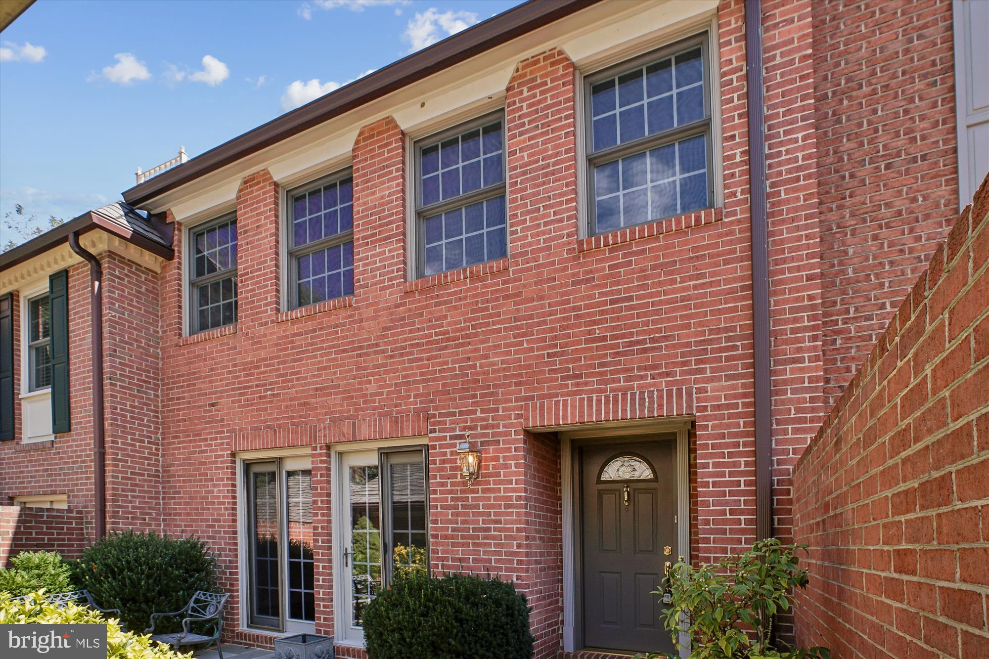2697 Marcey Road Arlington, VA 22207 - Photo 56 of 64 a front view of a building with potted plants