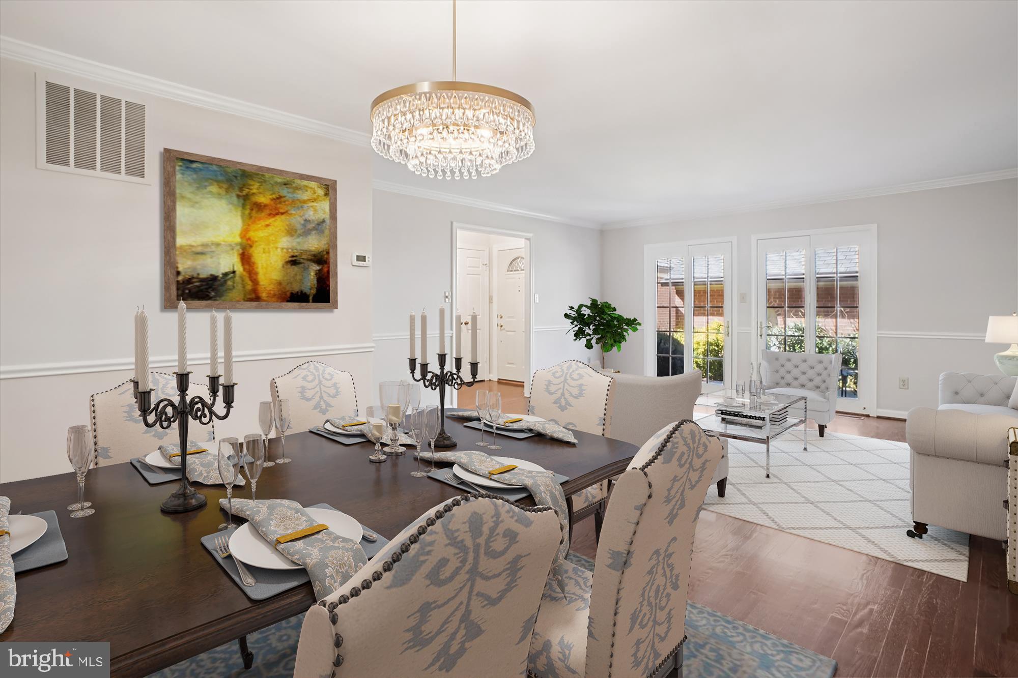 2697 Marcey Road Arlington, VA 22207 - Photo 8 of 64 a view of a dining room with furniture a chandelier and wooden floor