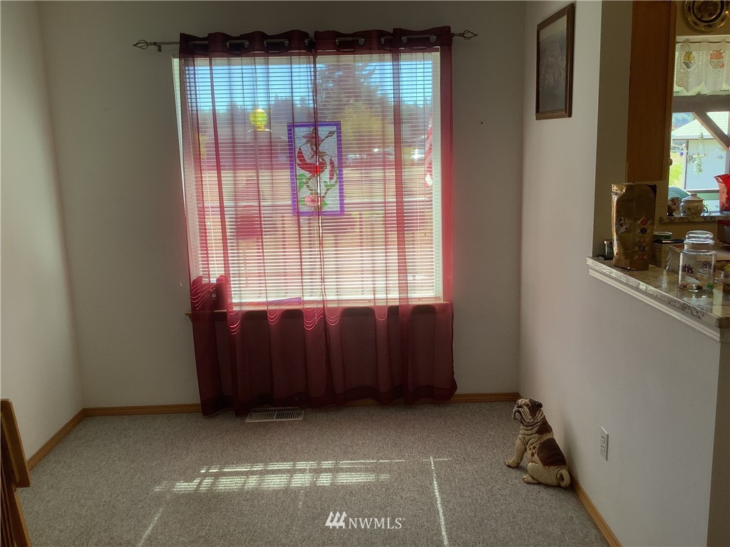 9323 180th Way Southwest Rochester, WA 98579 - Photo 16 of 33 a view of a window with an empty room