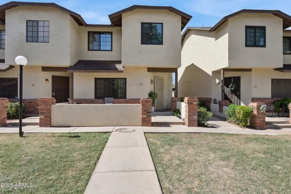 a front view of a house with entertaining space