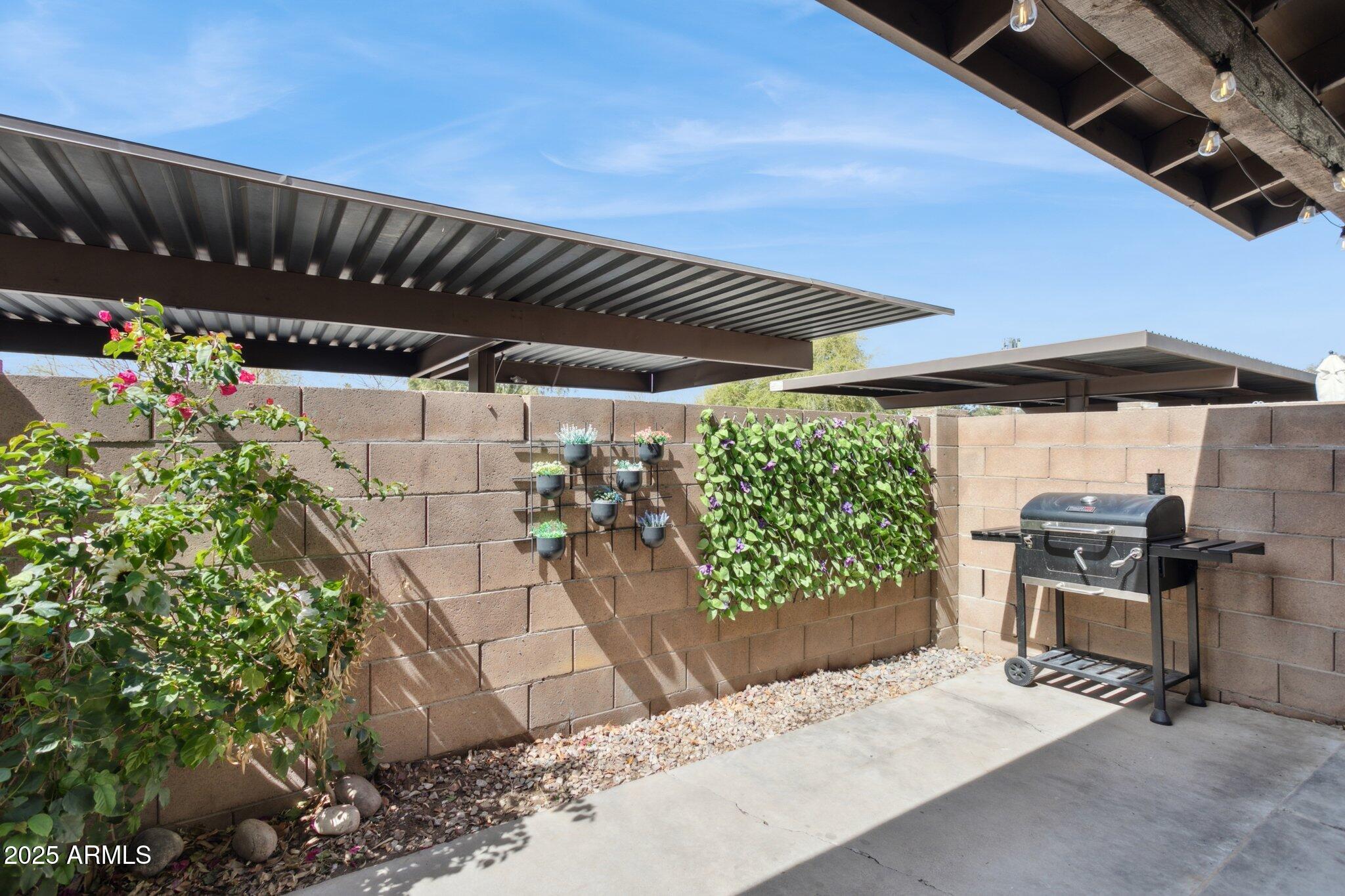 170 East Guadalupe Road, Unit 152 Gilbert, AZ 85234 - Photo 25 of 29 a view of outdoor space with seating area
