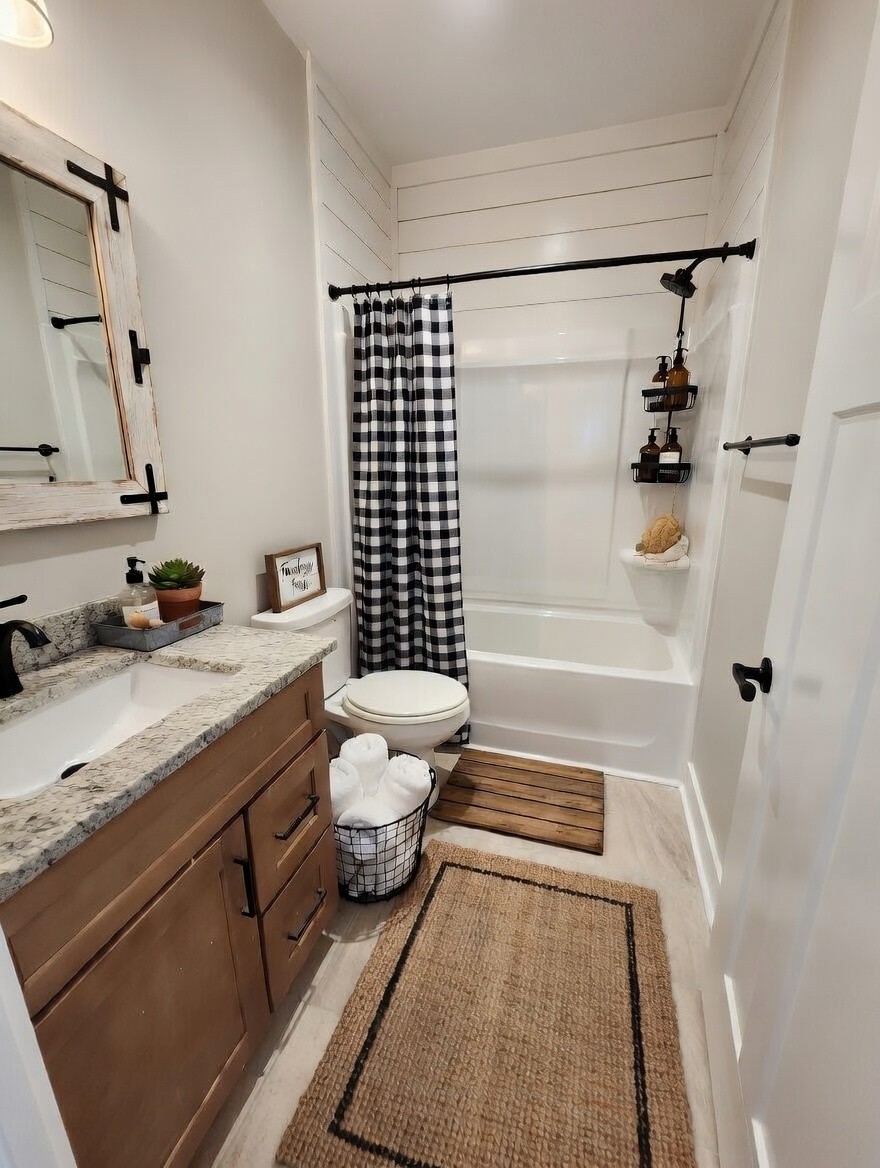 404 Cottage Lane Dickson, TN 37055 - Photo 17 of 35 a bathroom with a granite countertop sink toilet and shower