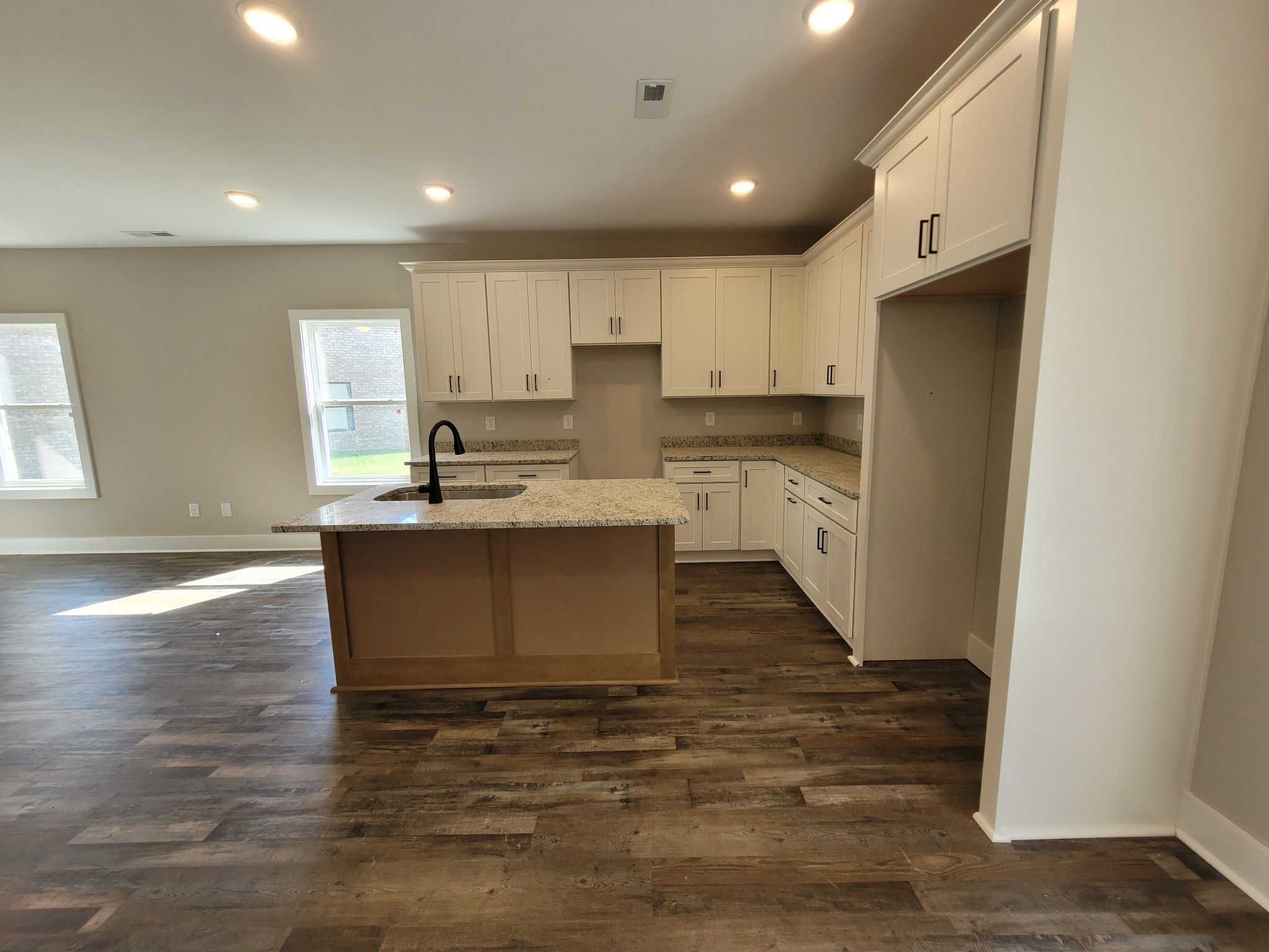 404 Cottage Lane Dickson, TN 37055 - Photo 24 of 35 a kitchen with a sink stove and refrigerator