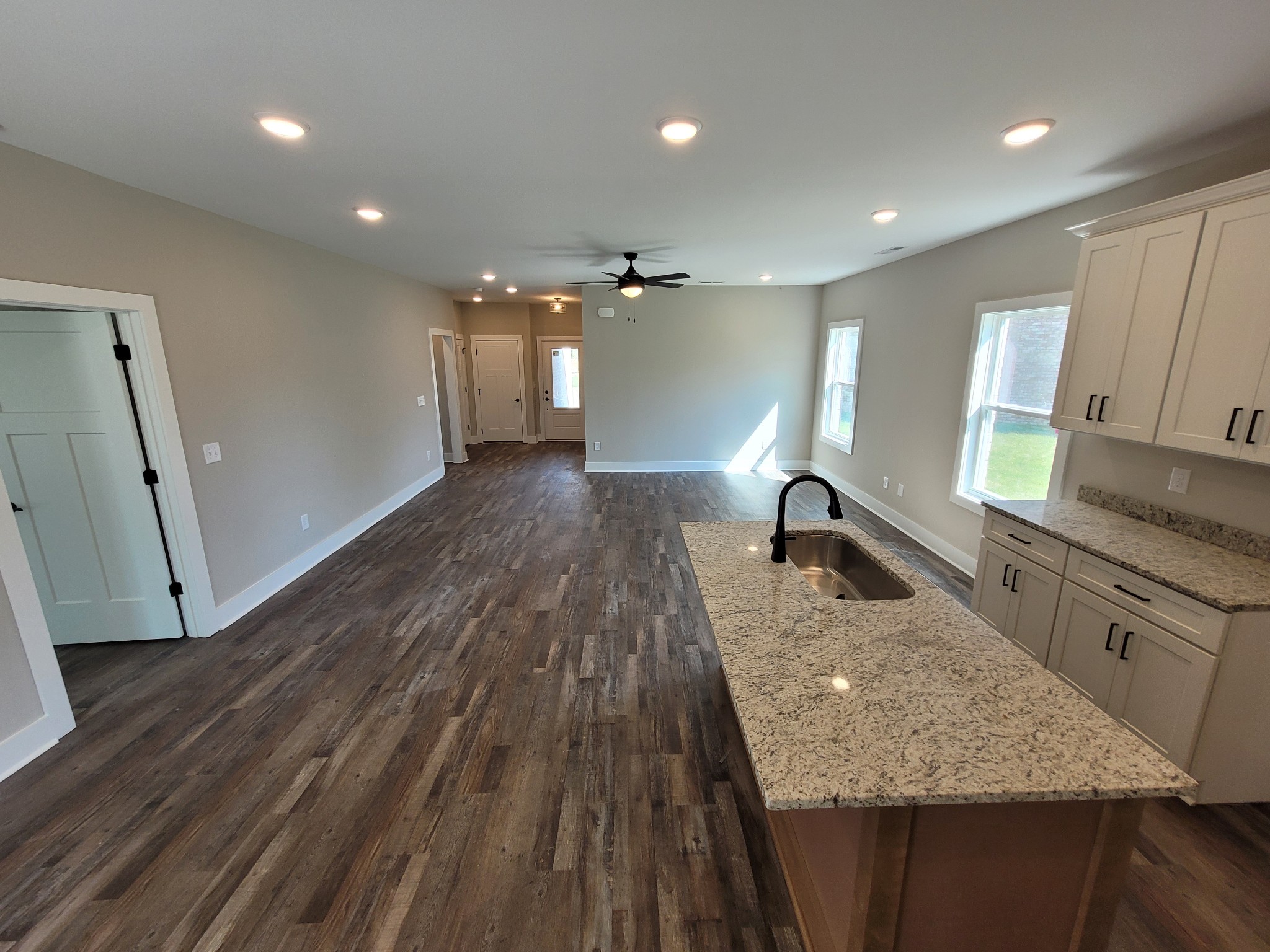 404 Cottage Lane Dickson, TN 37055 - Photo 25 of 35 a large kitchen with sink a refrigerator and wooden floor