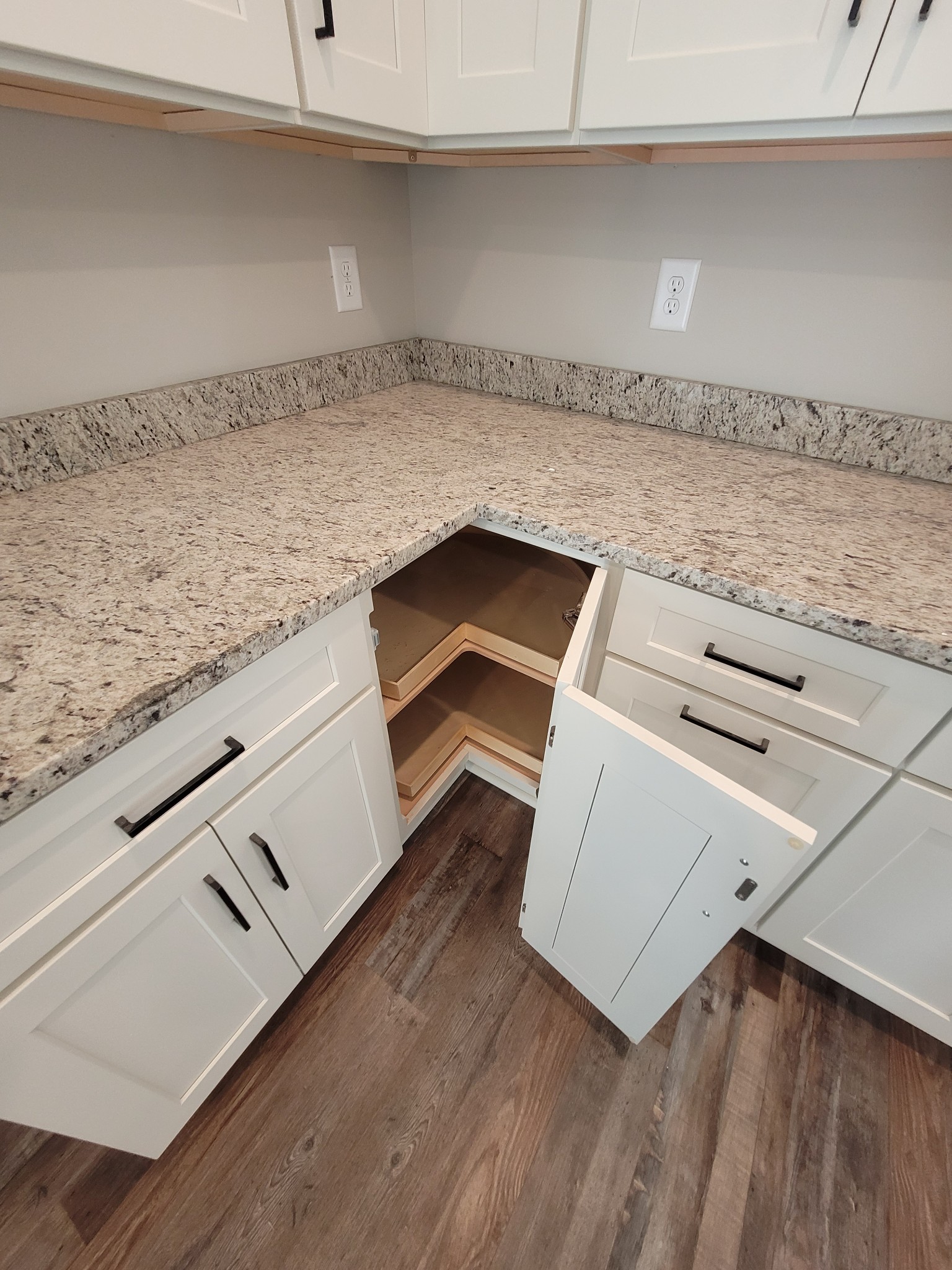 404 Cottage Lane Dickson, TN 37055 - Photo 28 of 35 a utility room with granite countertop white cabinets and a stove