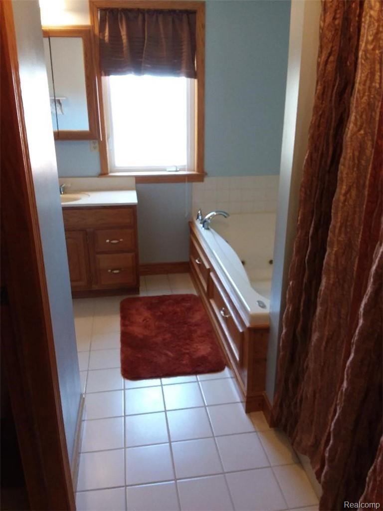 8240 West Lange Road Fowlerville, MI 48836 - Photo 30 of 50 8240 master bath.jpg
