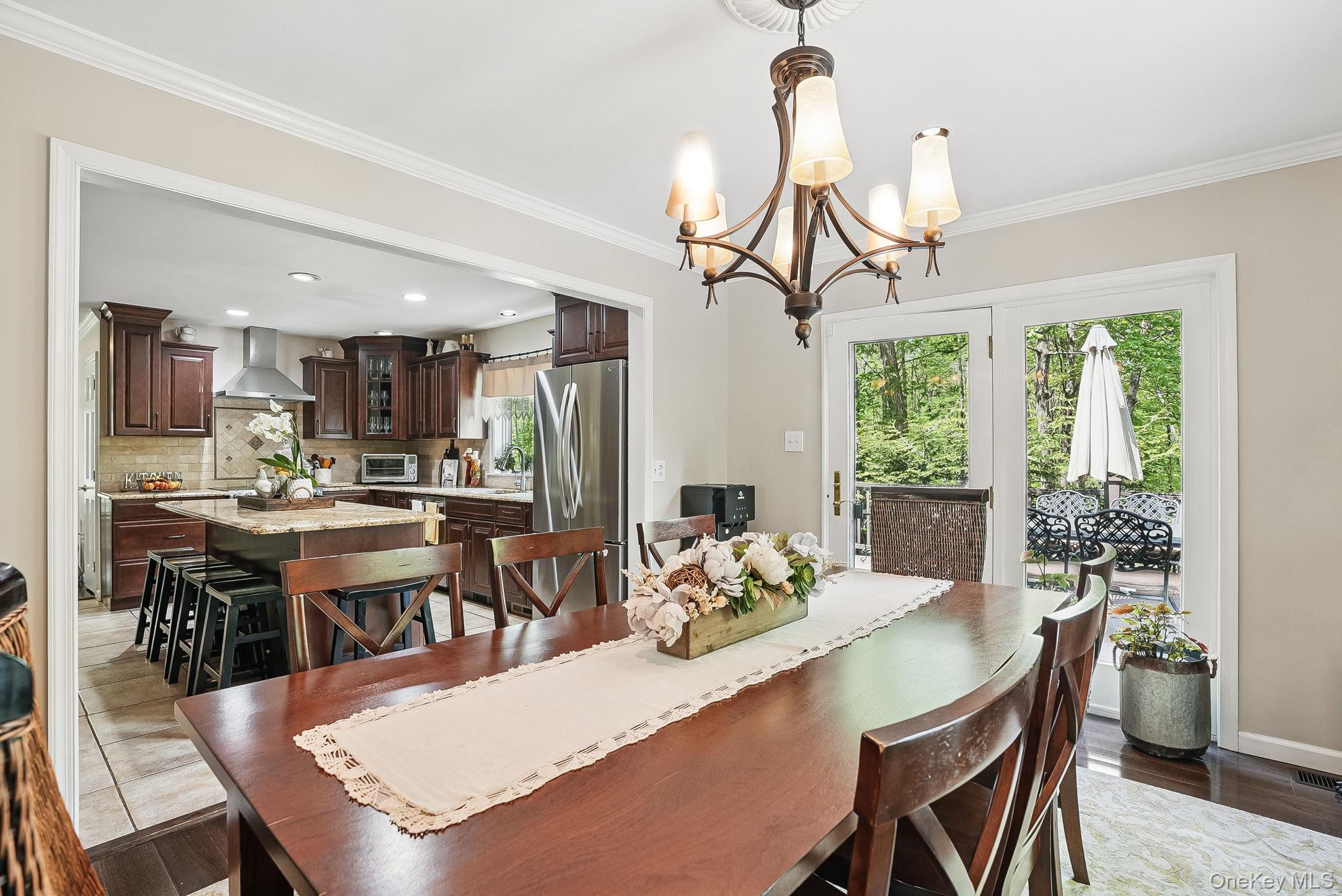 304 Church Road Putnam Valley, NY 10579 - Photo 12 of 50 Dining area with a chandelier, crown molding, and recessed lighting