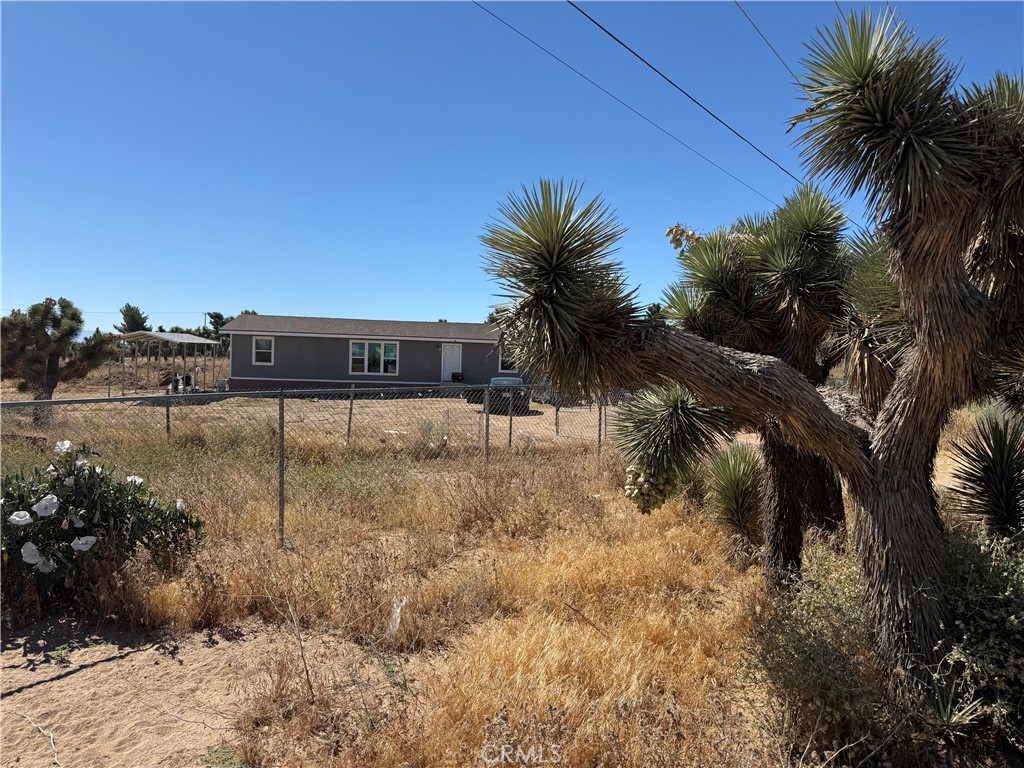 9589 Paramount Road Phelan, CA 92371 - Photo 29 of 29 a view of a backyard
