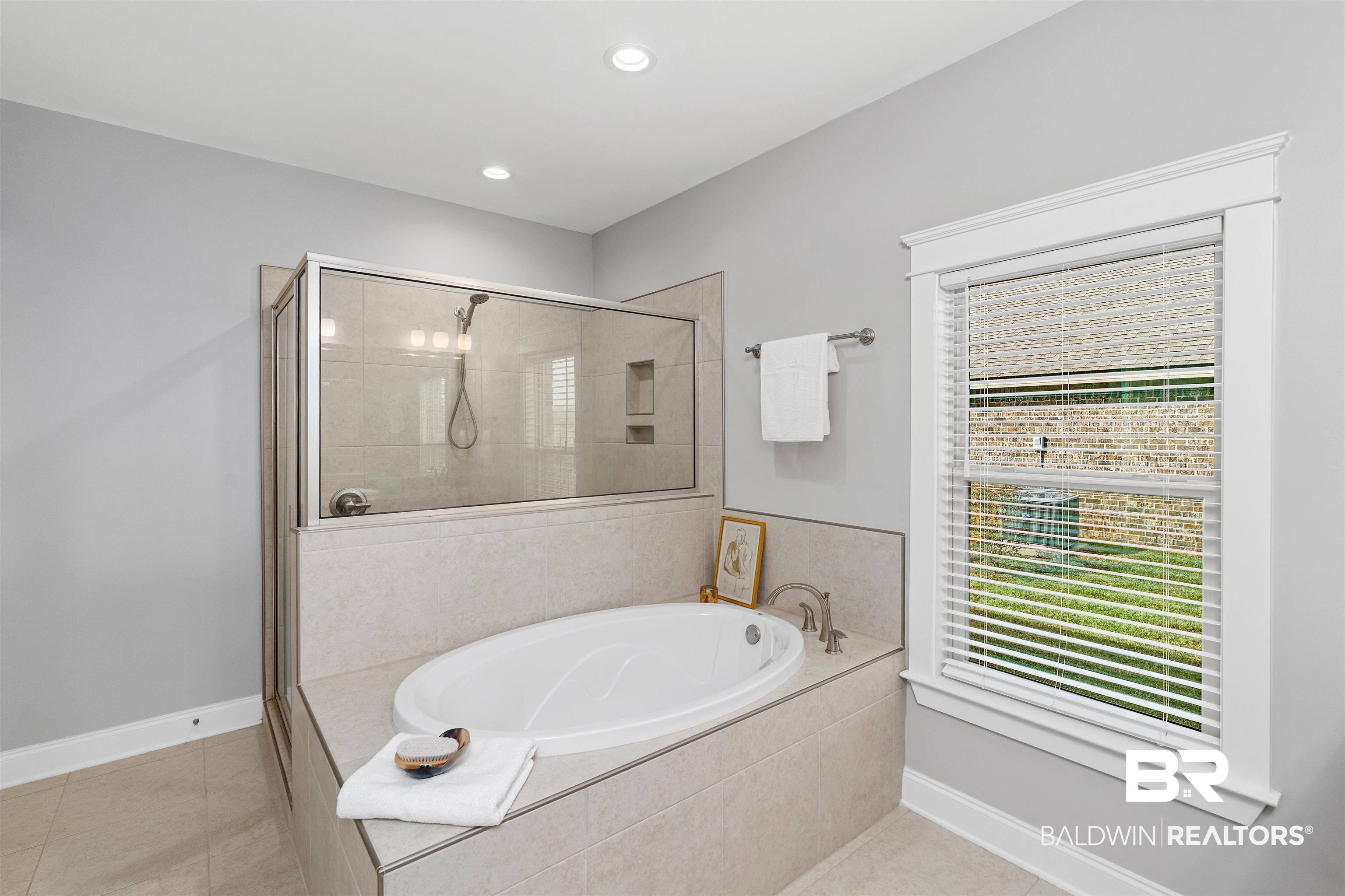 24838 Slater Mill Road Daphne, AL 36526 - Photo 35 of 46 Full bathroom featuring a garden tub, a shower stall, light tile patterned floors, and recessed lighting