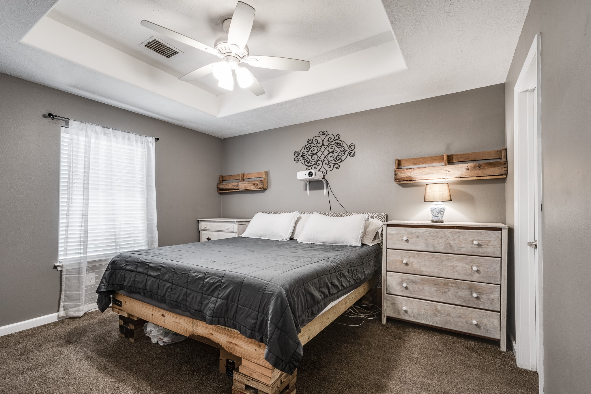 16392 Many Trees Lane Conroe, TX 77302 - Photo 17 of 33 The master bedroom entices you to relax and unwind