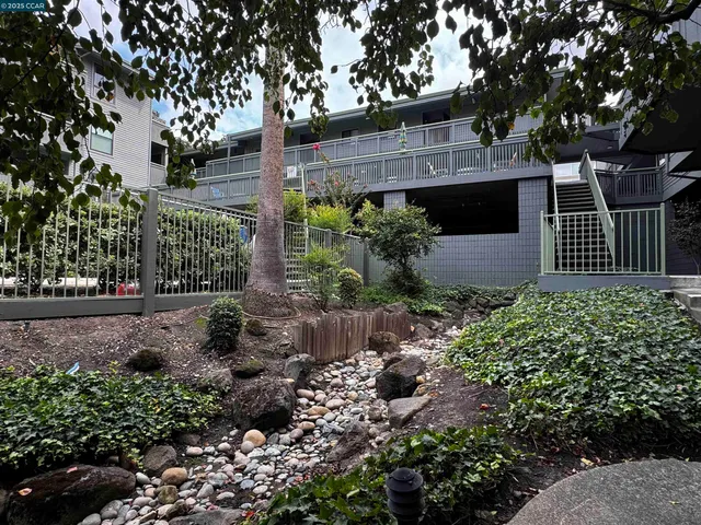 a view of a house with a garden