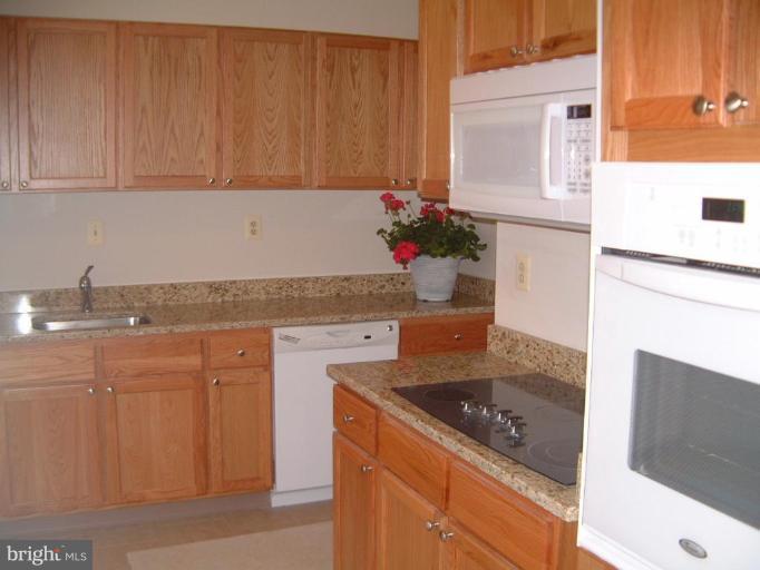 11505 Yates Street Silver Spring, MD 20902 - Photo 2 of 18 Fully renovated table-space kitchen top to bottom!