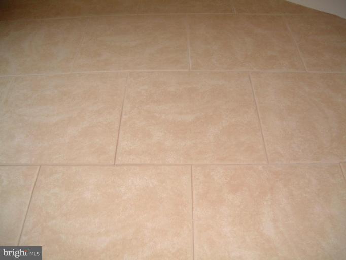 11505 Yates Street Silver Spring, MD 20902 - Photo 12 of 18 Beautiful ceramic tile floors in kitchen & foyer.