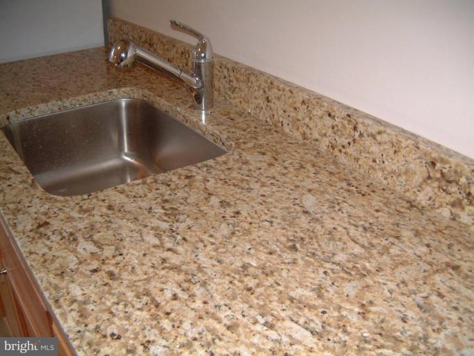 11505 Yates Street Silver Spring, MD 20902 - Photo 5 of 18 All new Granite countertops in kitchen!