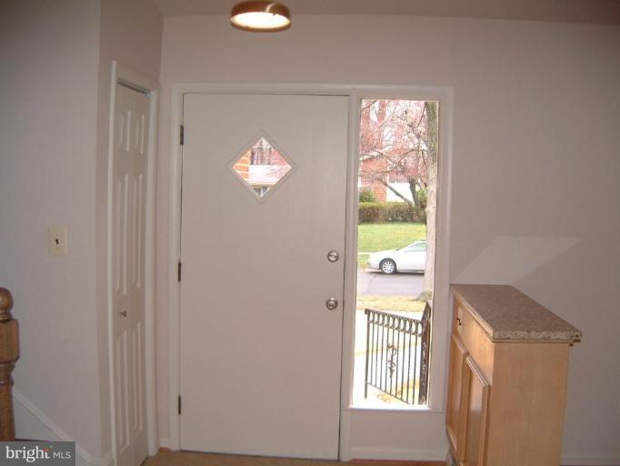 11505 Yates Street Silver Spring, MD 20902 - Photo 6 of 18 Sunny center entry foyer with coat closet.