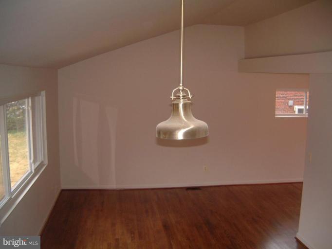 11505 Yates Street Silver Spring, MD 20902 - Photo 10 of 18 Spacious living room with valted ceiling.
