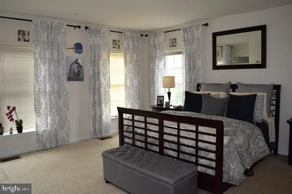 a front view of a building with balcony