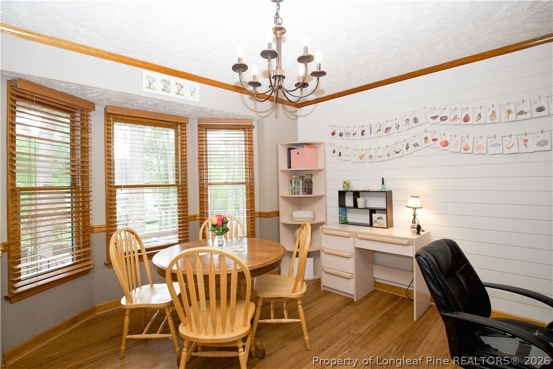 7815 Shuttle Road Fayetteville, NC 28311 - Photo 11 of 50 a view of a dining room with furniture window and outside view