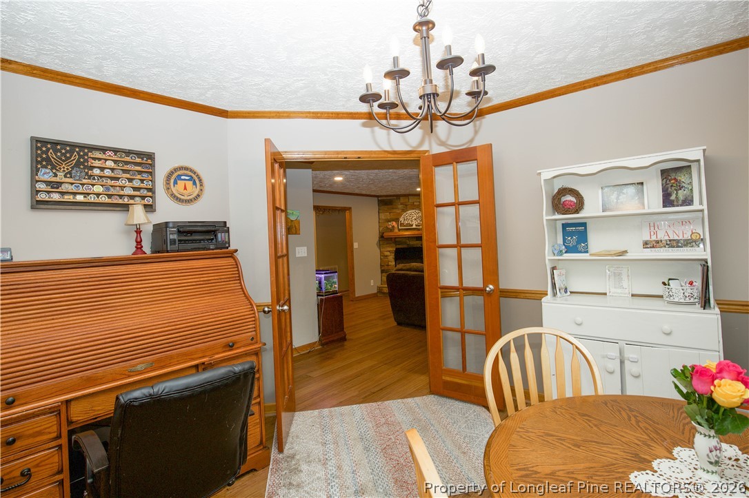 7815 Shuttle Road Fayetteville, NC 28311 - Photo 13 of 50 a view of a dining room with furniture
