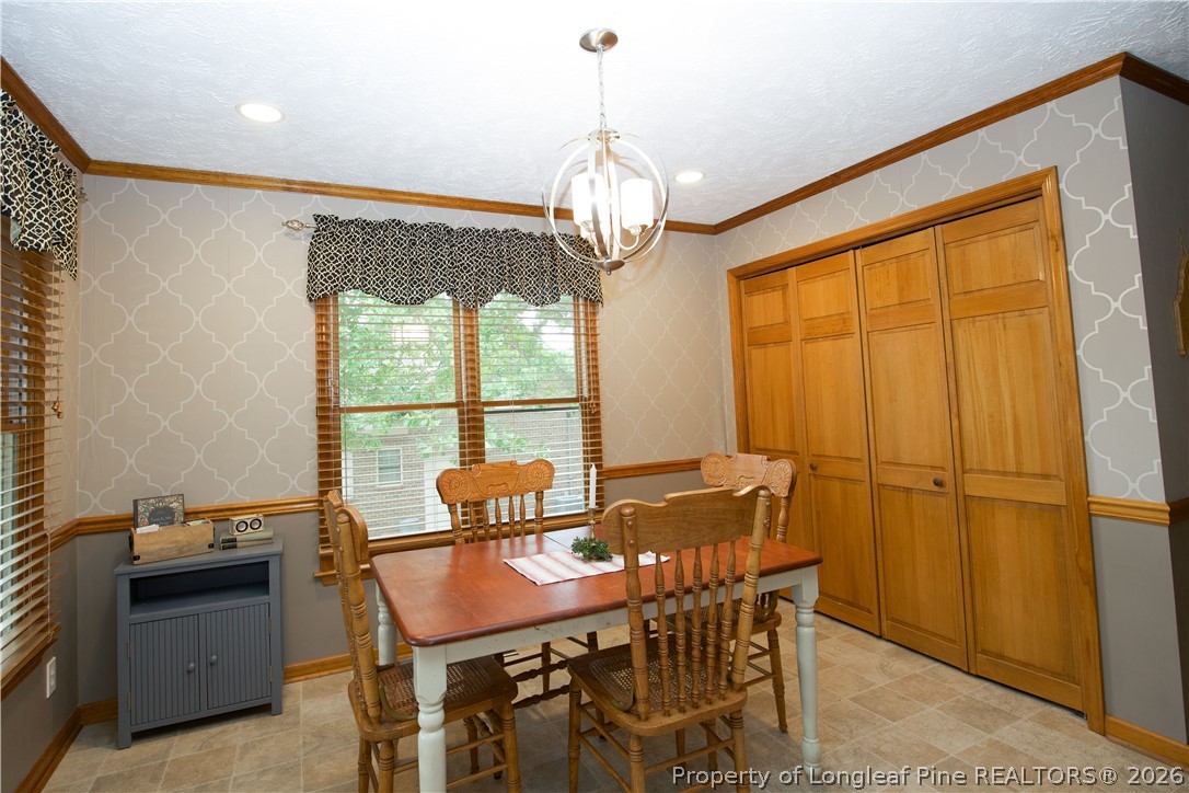 7815 Shuttle Road Fayetteville, NC 28311 - Photo 20 of 50 a view of a dining room with furniture window and outside view