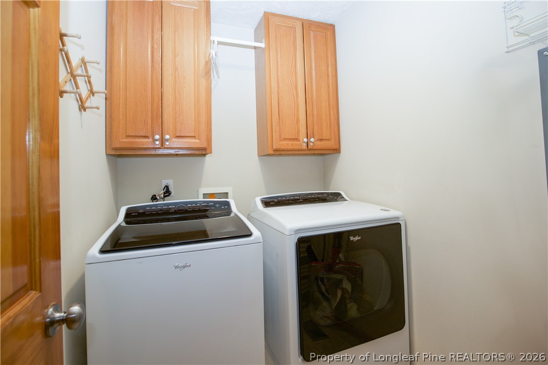 7815 Shuttle Road Fayetteville, NC 28311 - Photo 24 of 50 a utility room with dryer and washer