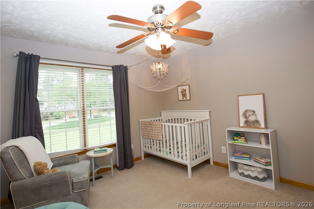7815 Shuttle Road Fayetteville, NC 28311 - Photo 26 of 50 a bedroom with furniture and a window