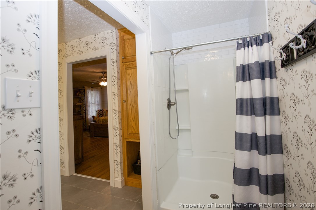 7815 Shuttle Road Fayetteville, NC 28311 - Photo 34 of 50 a bathroom with a shower