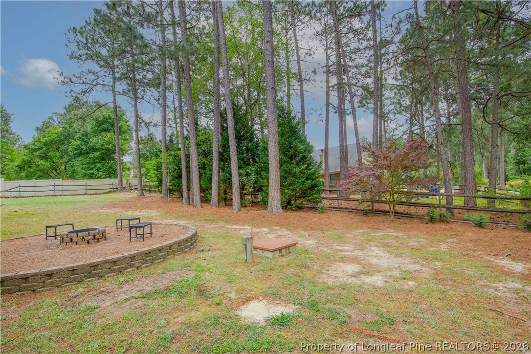 7815 Shuttle Road Fayetteville, NC 28311 - Photo 45 of 50 a view of swimming pool with trees in the background