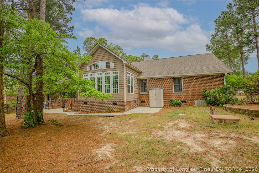 7815 Shuttle Road Fayetteville, NC 28311 - Photo 49 of 50 a view of a house with a outdoor space