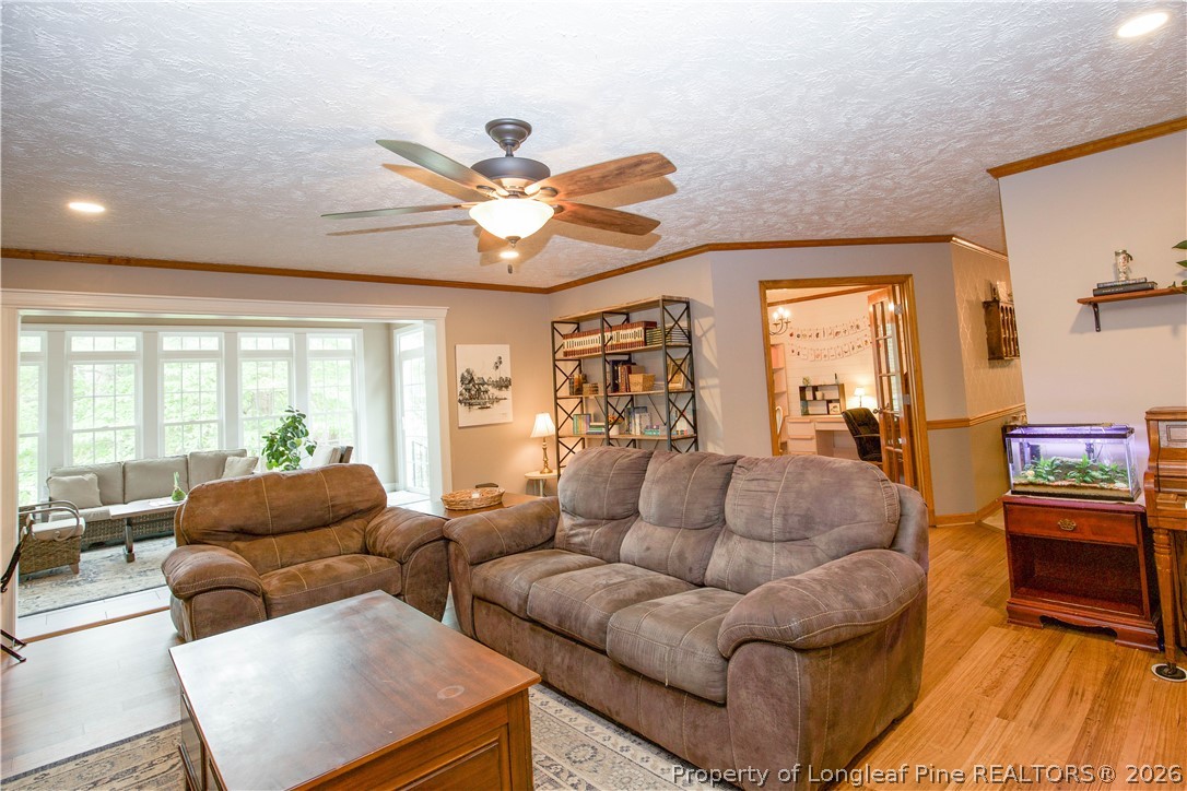 7815 Shuttle Road Fayetteville, NC 28311 - Photo 7 of 50 a living room with furniture and a large window