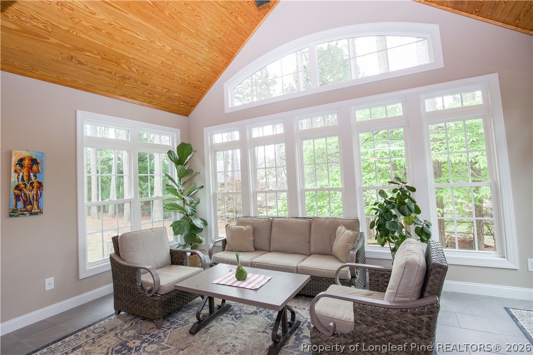 7815 Shuttle Road Fayetteville, NC 28311 - Photo 9 of 50 a living room with furniture and a large window
