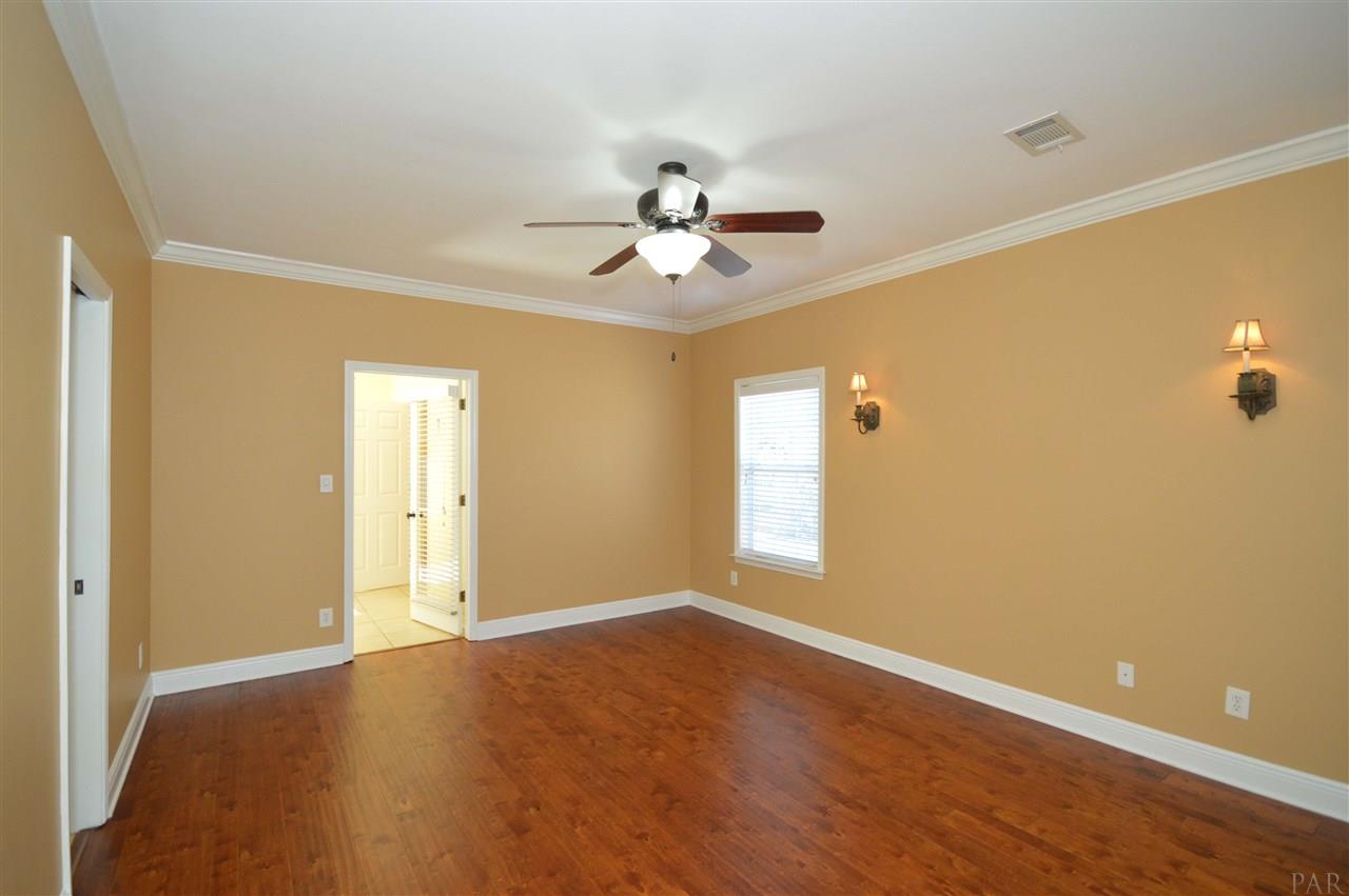 825 Copper Ridge Drive Cantonment, FL 32533 - Photo 17 of 50 French door leading to sunroom and pool/backyard