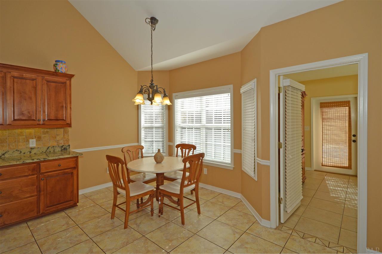 825 Copper Ridge Drive Cantonment, FL 32533 - Photo 8 of 50 French door to sunroom leading to pool/backyard
