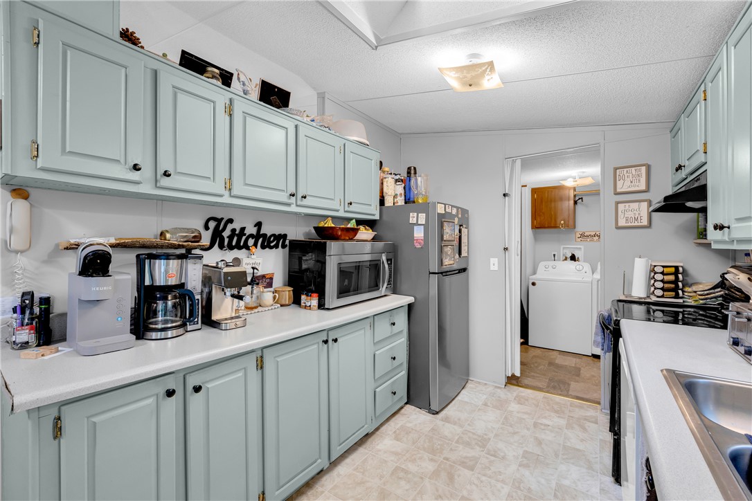 162 Newberry Road Walhalla, SC 29691 - Photo 12 of 50 Brightly lit kitchen with ample cabinet space, featuring a functional layout for daily tasks.