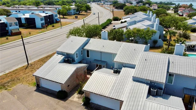 a view of city from balcony with seating space