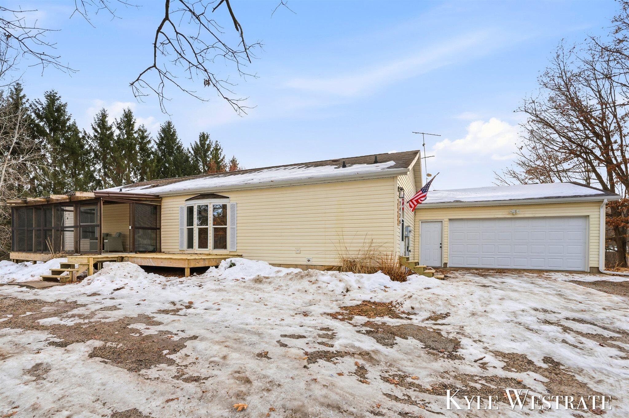 7976 10 Mile Road Northeast Rockford, MI 49341 - Photo 1 of 42 02-002_AIV00205