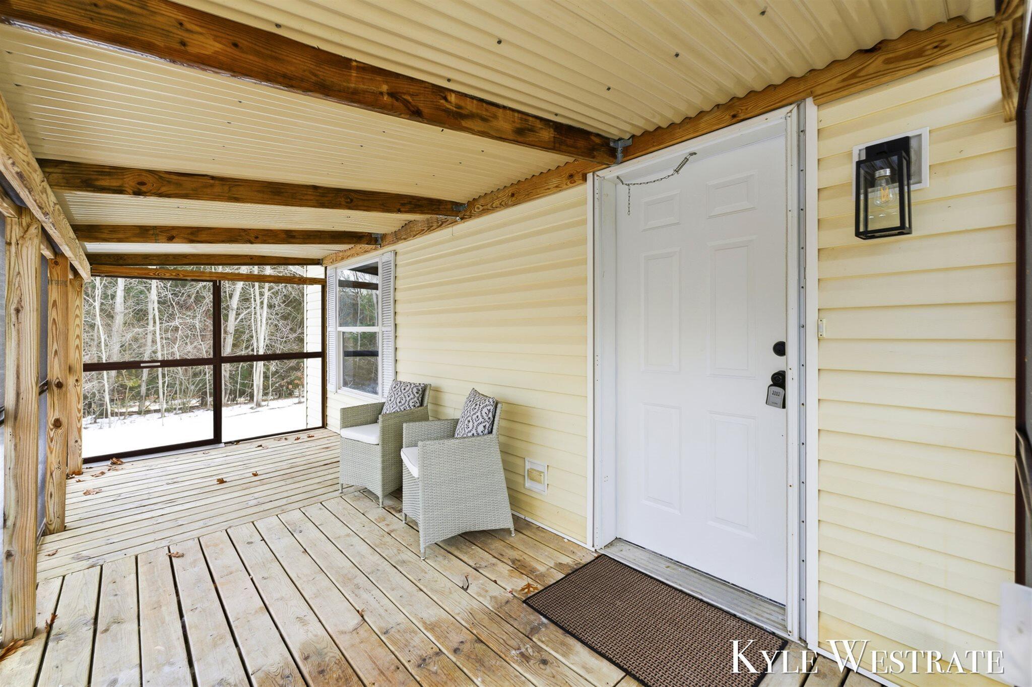 7976 10 Mile Road Northeast Rockford, MI 49341 - Photo 3 of 42 06-003_AIV00184