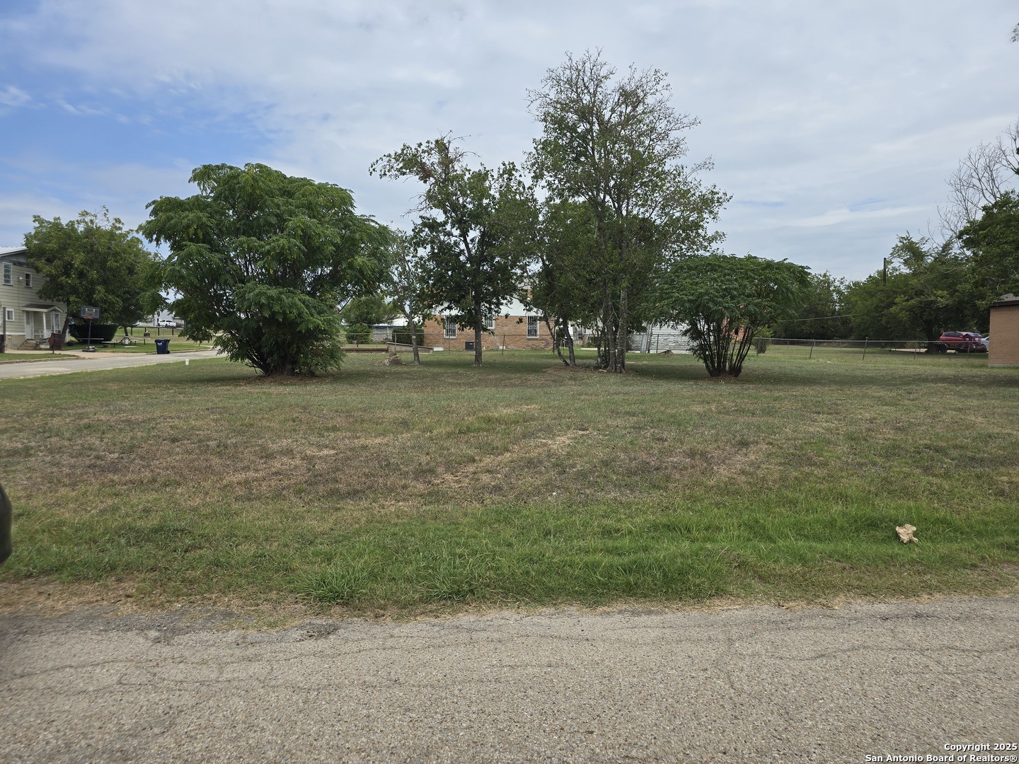 209 East 3rd Rockdale, TX 76567 - Photo 8 of 10 a view of a field with trees