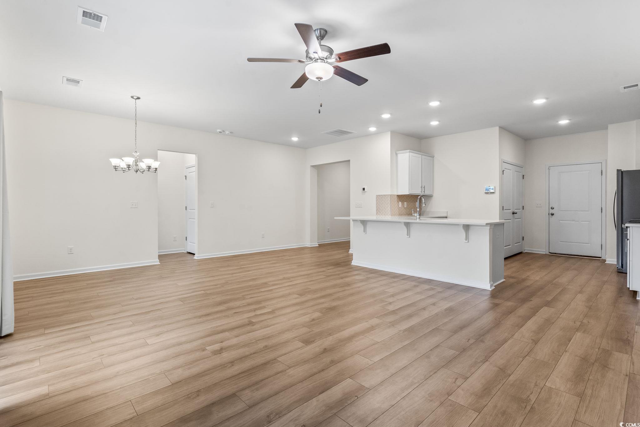 4115 Highway 19 Conway, SC 29526 - Photo 12 of 40 Perspective highlighting the open sight lines directly into the kitchen and dining areas.
